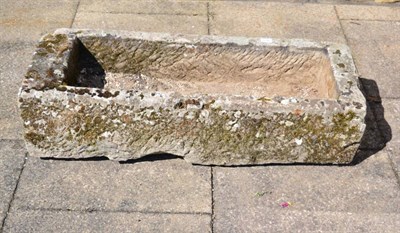 Lot 1286 - A narrow stone garden trough, 103cm wide