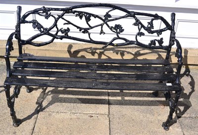 Lot 1289 - A Victorian cast iron bench decorated with vines