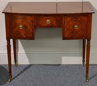 Lot 1298 - A Regency mahogany, boxwood and ebony strung bowfront small sideboard, early 19th century, with...