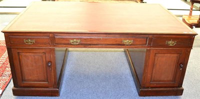 Lot 1300 - A late Victorian mahogany partner's desk