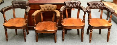 Lot 1302 - ~ A set of three late Victorian open armchairs with leather back support and arms, and a...