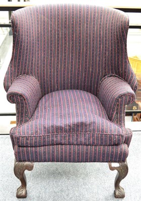 Lot 1323 - A Chippendale style wing chair