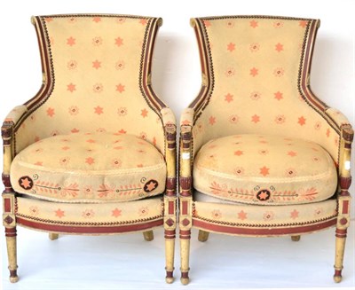 Lot 1334 - * A pair of late 19th century cream painted armchairs, upholstered in close nailed needlework...