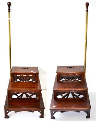 Lot 1342 - A pair of reproduction library steps, each with mahogany and brass handrails