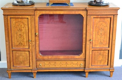 Lot 1356 - * A late Victorian satinwood display cabinet of inverted break front form