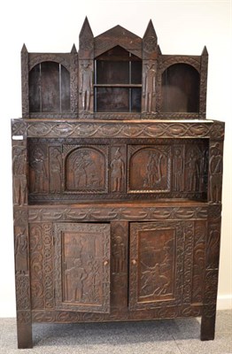 Lot 1360 - Carved oak court cupboard with superstructure in the 17th century style