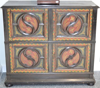 Lot 1364 - An ebonised and painted Arts & Crafts cupboard