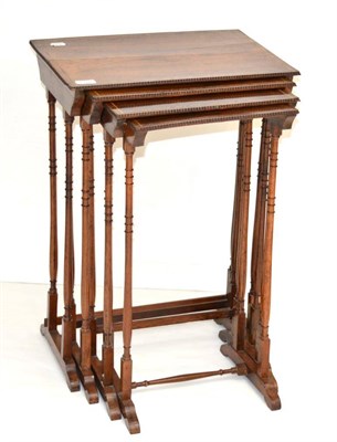 Lot 1386 - A nest of four rosewood and inlaid side tables