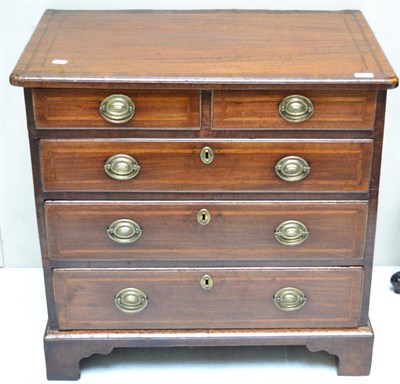 Lot 1393 - A George III mahogany chest of drawers