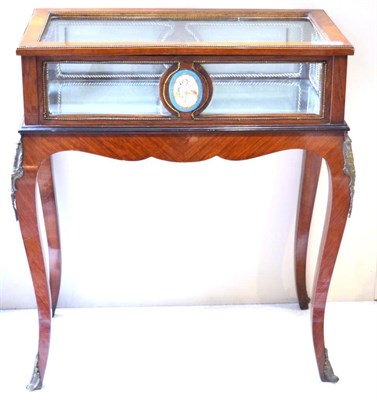 Lot 1395 - * A 19th century mahogany gilt mounted bijouterie table with sevres style porcelain mount