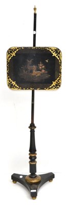 Lot 1405 - A Regency ebonised pole screen