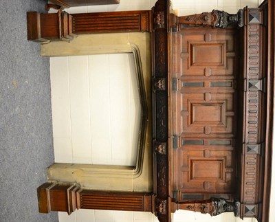 Lot 1408 - A large carved oak fireplace labelled Marsh Jones and Cribb