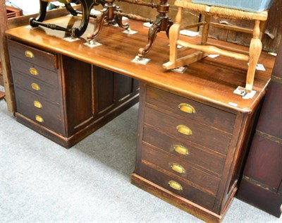 Lot 1439 - A 1920's oak partners desk