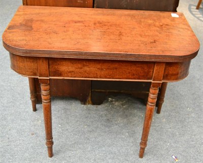 Lot 1500 - A George IV mahogany rounded rectangular fold over tea table