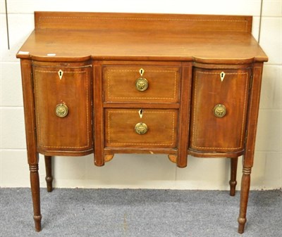 Lot 1506 - A small George III inverted breakfront sideboard