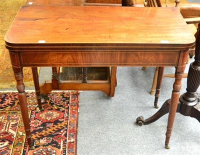 Lot 1521 - A Regency mahogany and boxwood strung fold over tea table (a.f.)