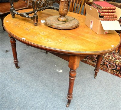 Lot 1522 - ~ A late Victorian mahogany oval table and a late Victorian mahogany octagonal shaped dining table