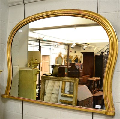 Lot 1528 - A gilded over mantel mirror