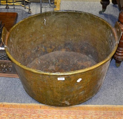 Lot 1536 - + A 19th century brass twin handled log bin, diameter 72cm