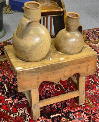 Lot 1544 - A Continental rack fitted with two amphora type jars