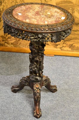 Lot 1564 - A Chinese carved marble top table