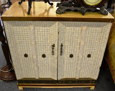 Lot 1568 - A painted TV cabinet with double doors