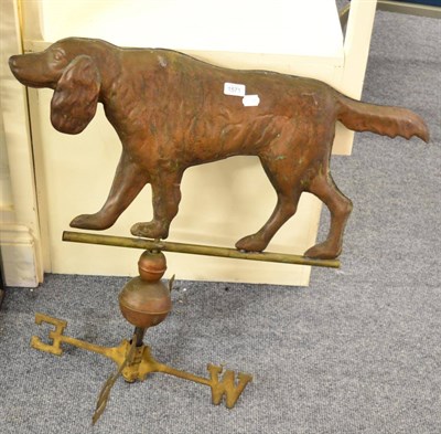 Lot 1571 - A weather vane in the form of a hunting dog