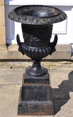 Lot 1595 - A pair of Victorian cast iron campana garden urns, height 90cm