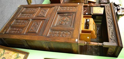 Lot 1605 - An 18th century carved oak court cupboard