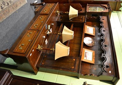 Lot 1609 - A Late 19th century oak dresser, the rack with a deep undulating pierced frieze over three...