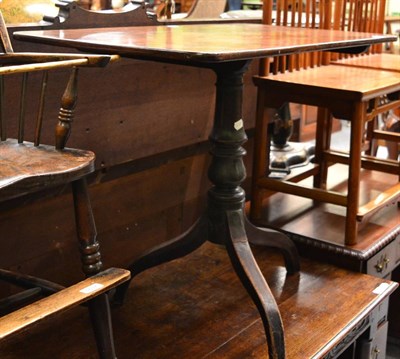 Lot 1636 - A George III mahogany flip top tripod table