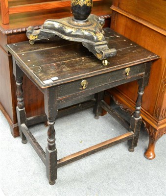 Lot 1643 - An early 18th century oak side table, fitted with drawer on turned spindle legs