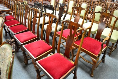 Lot 1666 - A set of eight walnut dining chairs in the 18th century style including two carvers