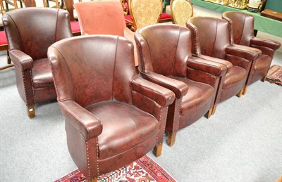 Lot 1671 - ~ A set of five 1930s club chairs, upholstered in close nailed leather raised on square forelegs