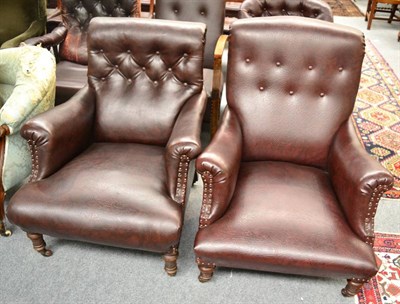 Lot 1672 - ~ A near pair of late Victorian armchairs, later recovered in close nailed brown leather