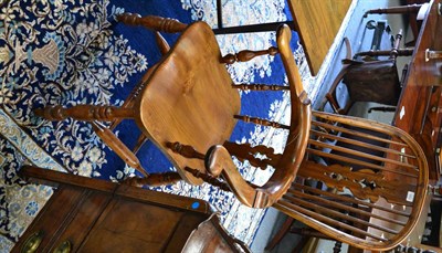 Lot 1682 - A yewwood broad arm Windsor chair