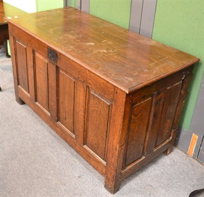 Lot 1688 - + An 18th century joined oak chest with hinged lid