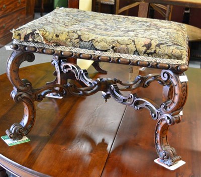 Lot 1690 - A Victorian carved walnut dressing stool