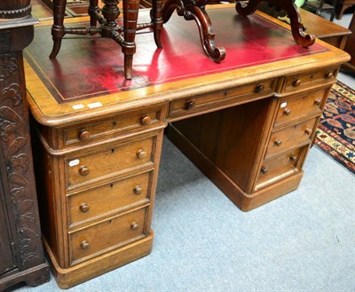 Lot 1709 - A late Victorian oak double pedestal desk