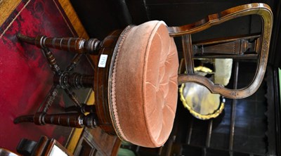 Lot 1710 - A late Victorian walnut adjustable revolving music chair, with over stuffed seat