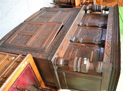 Lot 1712 - An 18th century carved oak court cupboard