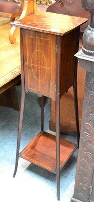 Lot 1713 - * An Edwardian mahogany and tulipwood banded plant stand, fitted with cupboard door, 107cm high