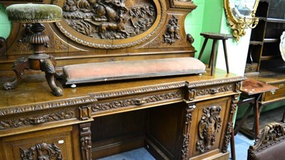 Lot 1729 - A Victorian revolving piano stool, a Victorian double footstool, a carved oak octagonal shaped...