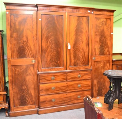 Lot 1732 - A Georgian III mahogany breakfront wardrobe