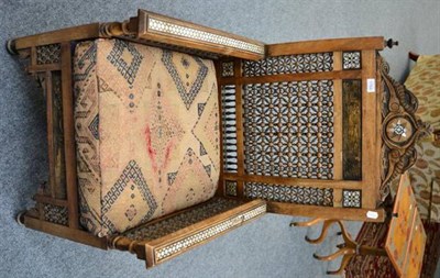 Lot 1764 - A pair of Persian mother-of-pearl inlaid armchairs