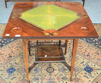 Lot 1767 - A late Victorian rosewood envelope card table