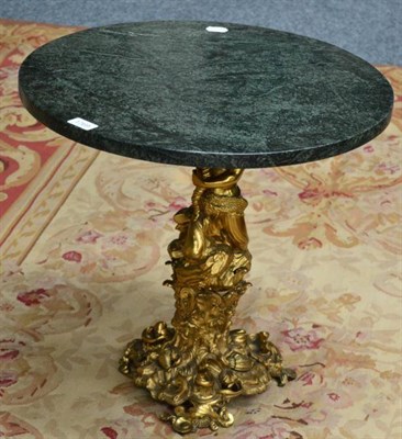 Lot 1769 - * A good 19th century ormulu tripod table with figural support and leaf cast base supporting a...