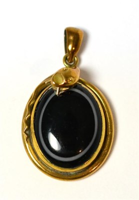 Lot 3 - A Victorian sardonyx set pendant, with serpent motif and locket back, measures 3.4cm by 5.6cm