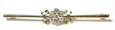 Lot 11 - A diamond cluster bar brooch, a central cluster of seven old cut diamonds in white millegrain...