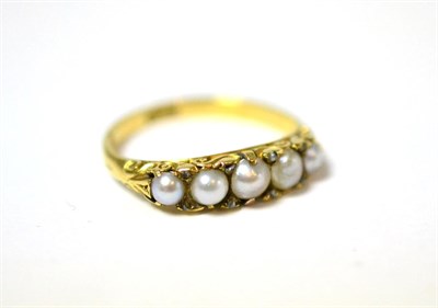 Lot 16 - A Victorian pearl and diamond ring, five graduated split pearls spaced by pairs of rose cut diamond